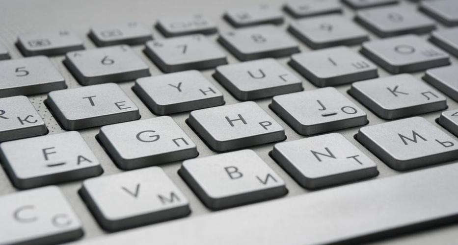 灰黑电子科技键盘按键特写电子产品办公娱乐学习信息技术背景图片